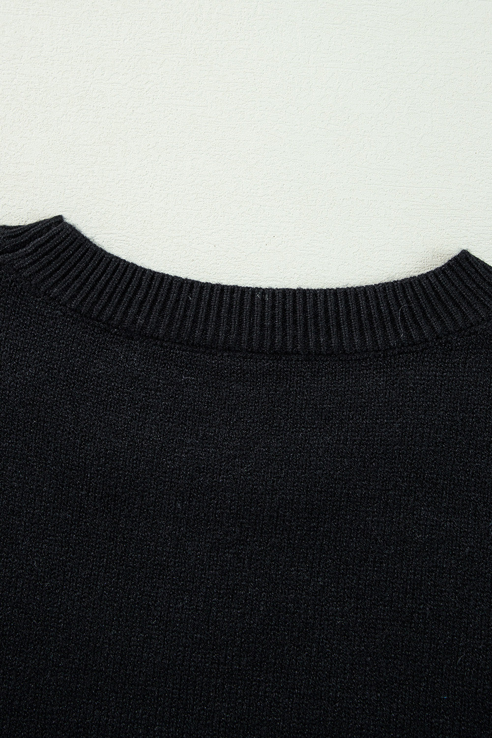 Boo Knitted Pattern Ribbed Edge Drop Shoulder Sweater